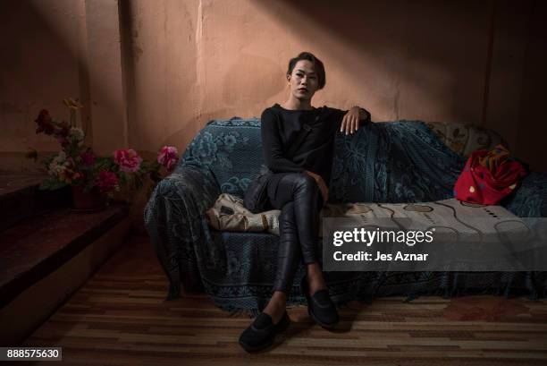 Jane Laut a transgender resident of Marawi city poses for a portrait inside the house of her friend on October 21, 2017 in Saguiaran, southern...
