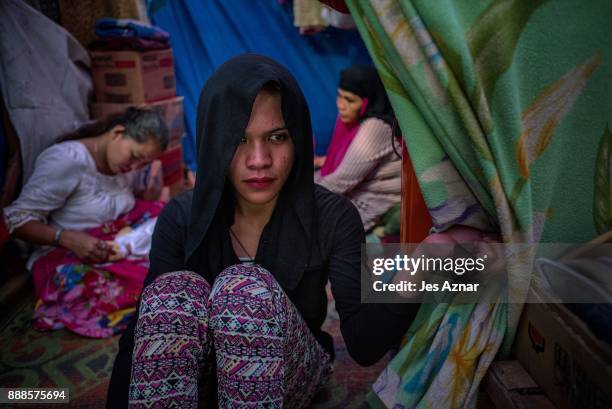 Krang inside a makeshift evacuation center where he lives with his family on November 24, 2017 in Saguiaran, southern Philippines. As the battle...