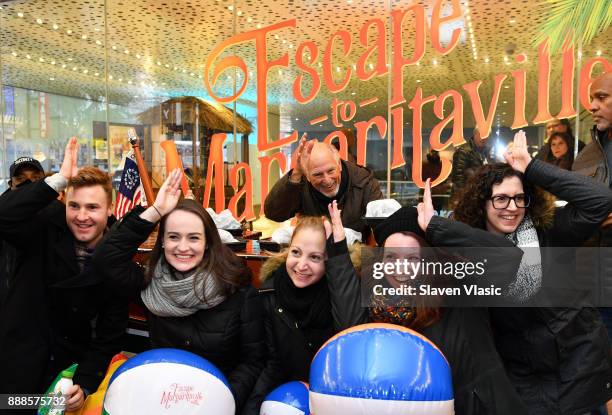 Musician Jimmy Buffett helps open Box Office for "Escape To Margaritaville" on Broadway at Marquis Theatre on December 8, 2017 in New York City.