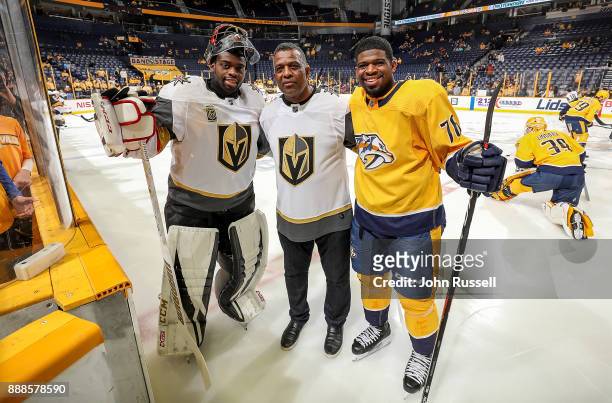 Karl Subban poses with his sons P.K. Subban of the Nashville Predators and Malcolm Subban of the Vegas Golden Knights prior to an NHL game at...
