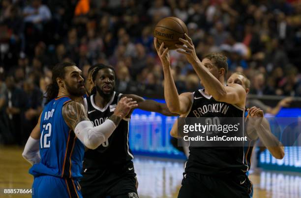 Timofey Mozgov of Nets takes a rebound during the NBA match between Brooklyn Nets and Oklahoma City Thunder at Arena Ciudad de Mexico on December 07,...