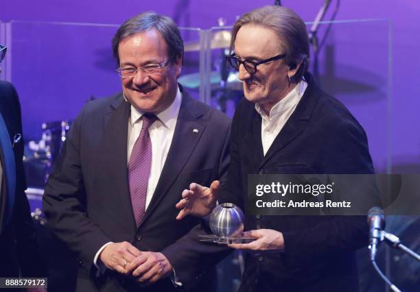 Marius Mueller-Westernhagen receives the award from Armin Laschet during the German Sustainability Award at Maritim Hotel on December 8, 2017 in...