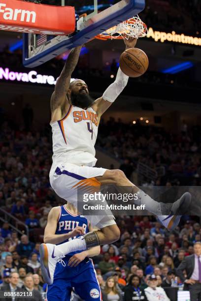 Tyson Chandler of the Phoenix Suns dunks the ball against the Philadelphia 76ers at the Wells Fargo Center on December 4, 2017 in Philadelphia,...