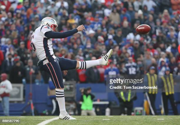 Ryan Allen of the New England Patriots punts the ball during NFL game action against the Buffalo Bills at New Era Field on December 3, 2017 in...