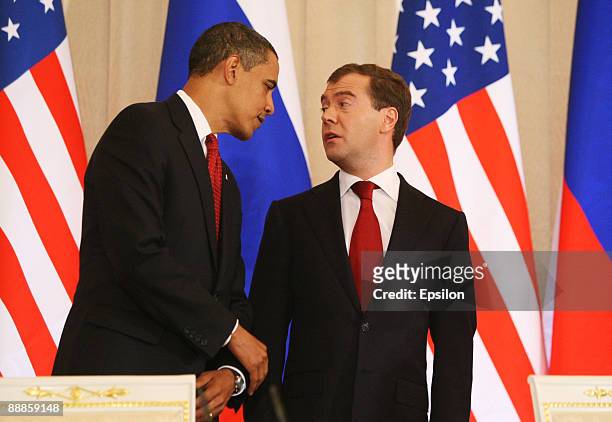 President Barack Obama shakes hands with Russian President Dmitry Medvedev as they hold their press conference after the signing ceremony of the...
