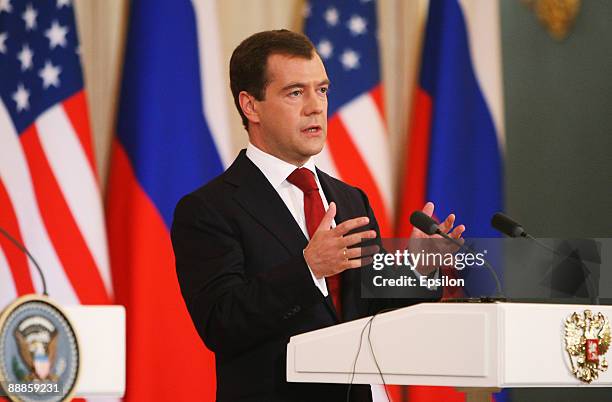 Russian President Dmitry Medvedev speaks during a press conference with U.S. President Barack Obama after the signing ceremony of the Joint...