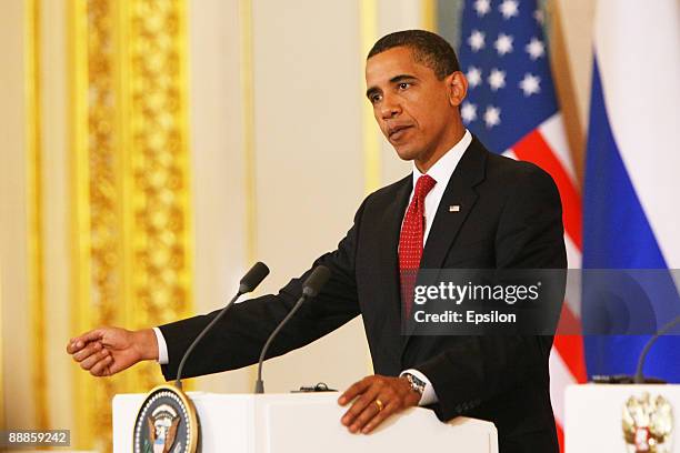 President Barack Obama speaks as he holds a press conference with Russian President Dmitry Medvedev after the signing ceremony of the Joint...