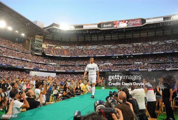 New Real Madrid player Cristiano Ronaldo is presented to a full house at the Santiago Bernabeu stadium on July 6, 2009 in Madrid, Spain.