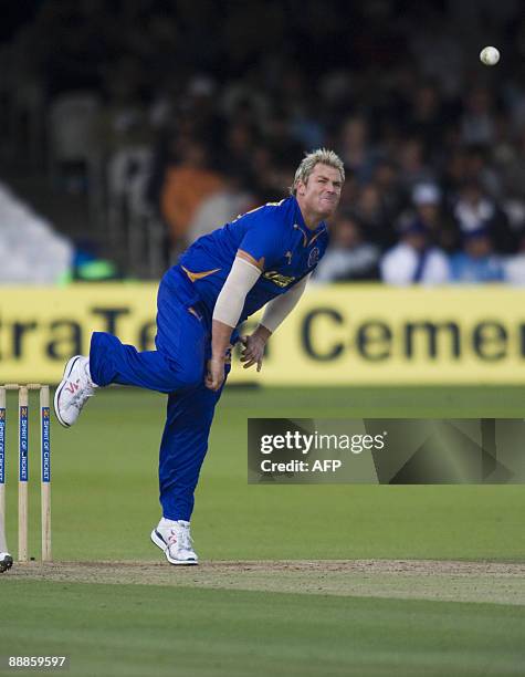 Rajasthan Royals Shane Warne bowls against Middlesex Panthers during the Twenty Twenty British Asian Challenge at Lords cricket ground in London on...