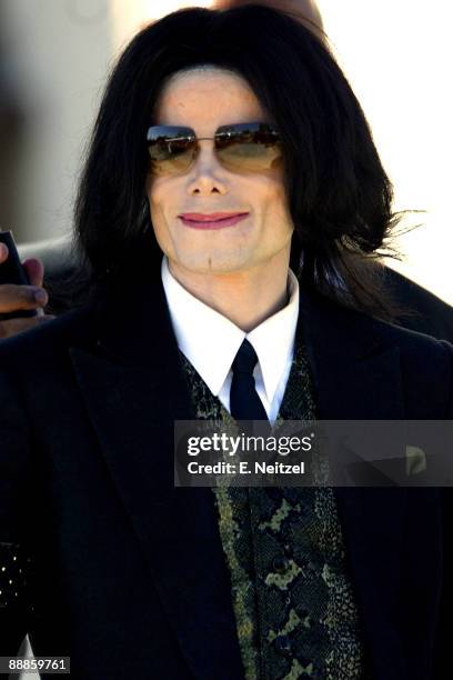 Michael Jackson leaves the Santa Barbara Superior Court after the 8th day of testimony in his child molestation trial in Santa Maria, California....