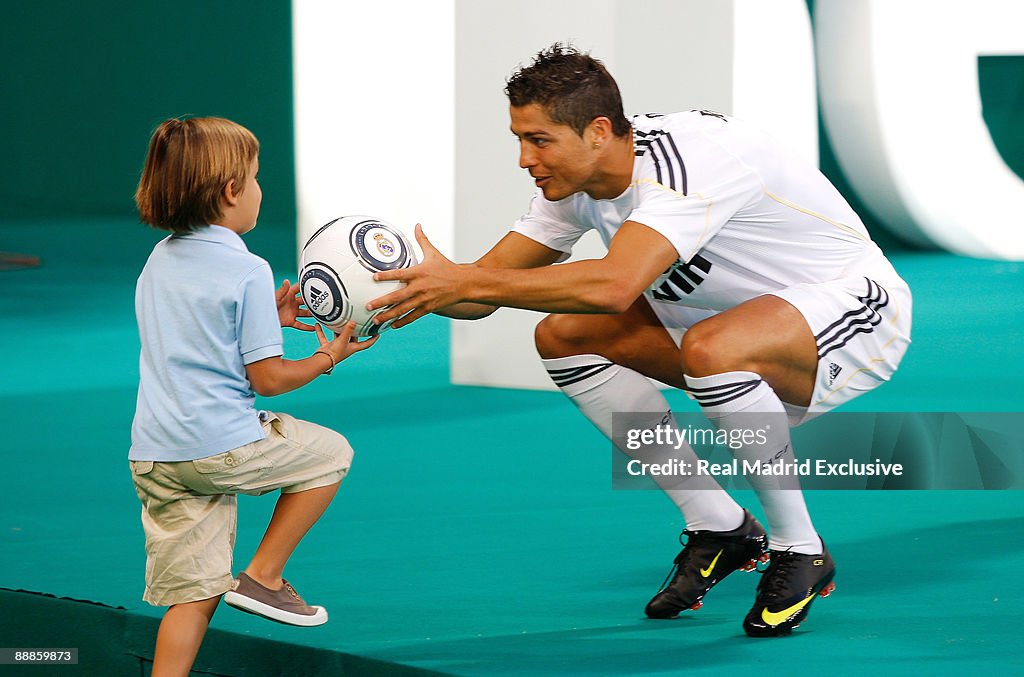 Dominic Rinaldo Ball Cristiano Ronaldo gives a ball during his official presentation as ...