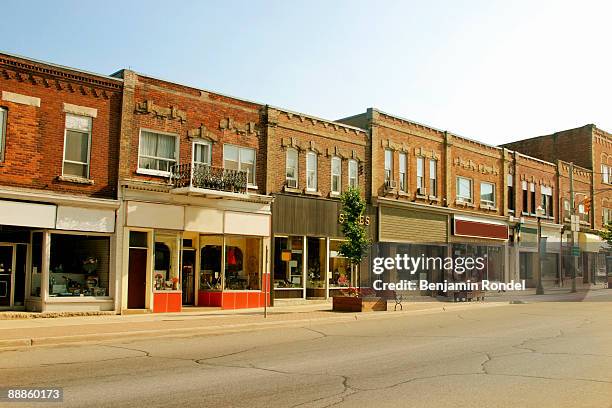 storefront buildings in a small town - vintage downtown stock pictures, royalty-free photos & images