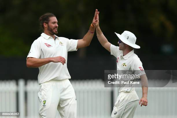 Nick Buchanan of the CA XI celebrates the wicket of Dan Lawrence of England during the Two Day tour match between the Cricket Australia CA XI and...