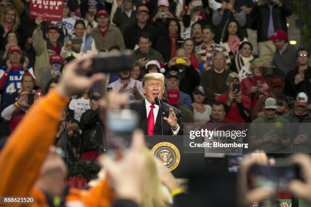 President Donald Trump speaks during a rally in Pensacola, Florida, U.S., on Friday, Dec. 8, 2017. Trump gave his most full-throated endorsement yet...