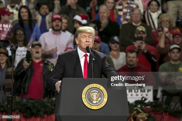 President Donald Trump speaks during a rally in Pensacola, Florida, U.S., on Friday, Dec. 8, 2017. Trump gave his most full-throated endorsement yet...