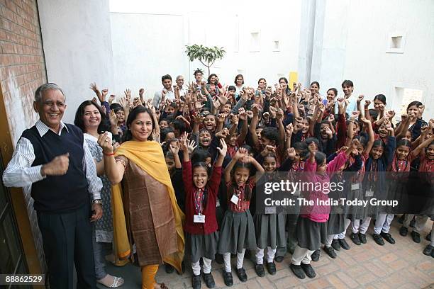 Shilin, Priti and Vasani with Students of Adani Vidayalaya in Gujarat, India