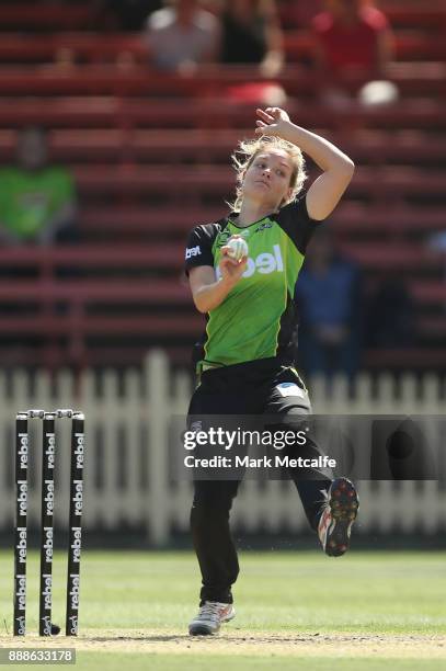 Nicola Carey of the Thunder bowls during the Women's Big Bash League WBBL match between the Melbourne Renegades and the Sydney Thunder at North...