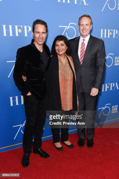 Eric McCormack, Meher Tatna and Bob Greenblatt attend Hollywood Foreign Press Association Hosts Annual Holiday Party And Golden Globes 75th...