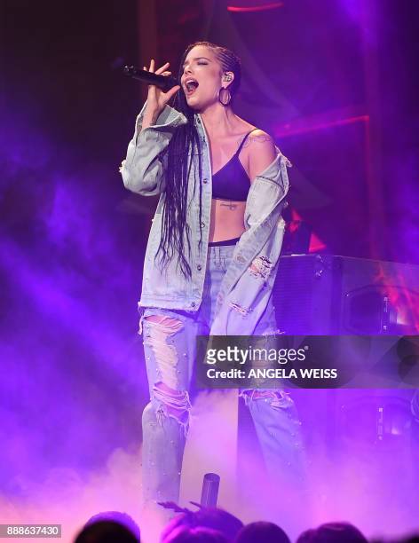 Halsey performs at the Z100's iHeartRadio Jingle Ball 2017 at Madison Square Garden on December 7, 2017 in New York. / AFP PHOTO / ANGELA WEISS