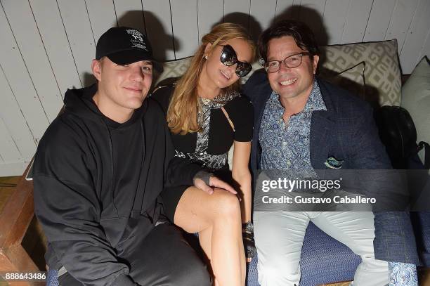 Chris Zylka, Paris Hilton, and Founder & Chief Butler of Photo Butler, Andy Goldfarb attend Rosario Dawson Hosts The Launch Of Photo Butler At Art...