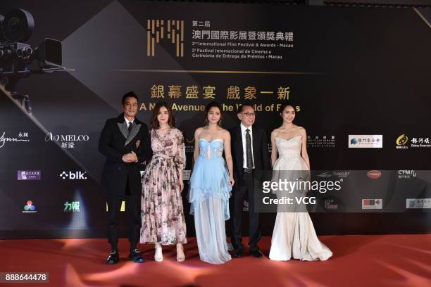 Actor Simon Yam, singer and actress Charlene Choi, actress Michelle Wai, Chairman of Emperor Group Albert Yeung and actress Kathy Tong arrive on the...