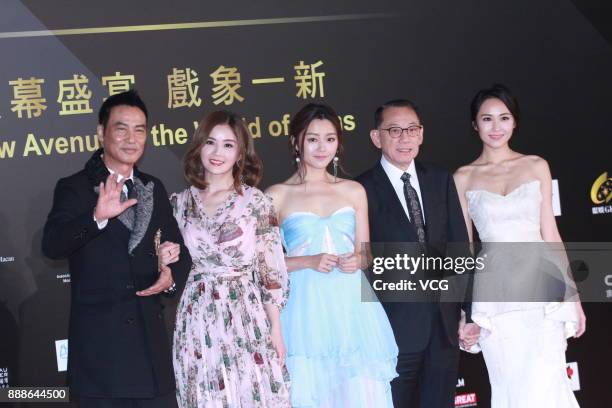 Actor Simon Yam, singer and actress Charlene Choi, actress Michelle Wai, Chairman of Emperor Group Albert Yeung and actress Kathy Tong arrive on the...