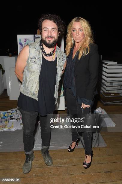Artist Tiago Magro and Anna Rothschild attend Rosario Dawson Hosts The Launch Of Photo Butler At Art Basel With Anna Rothschild And Claudine De Niro...
