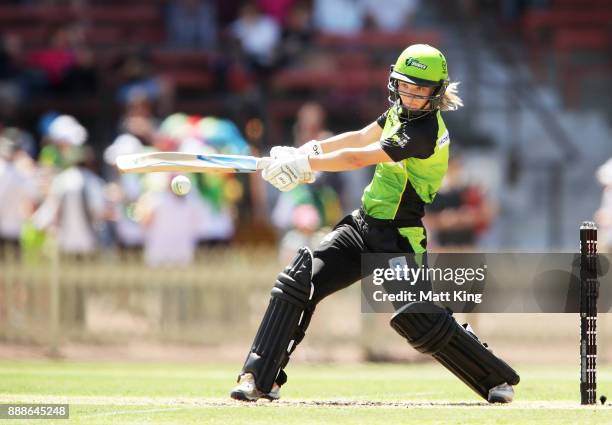 Nicola Carey of the Thunder bats during the Women's Big Bash League WBBL match between the Melbourne Renegades and the Sydney Thunder at North Sydney...