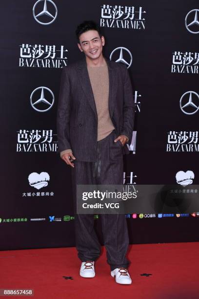 Actor Yang Shuo arrives on the red carpet of 2017 Bazaar Men of The Year on December 8, 2017 in Beijing, China.