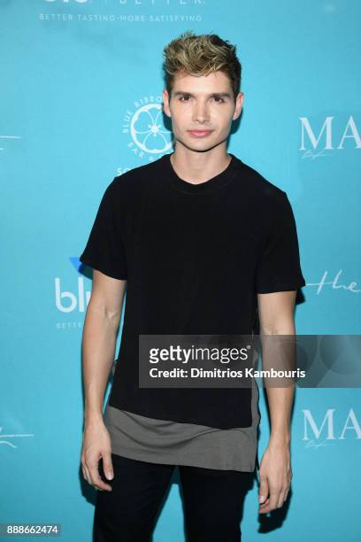 Christian Acosta attends the Maxim December Miami Issue Party Presented by blu on December 8, 2017 in Miami Beach, Florida.