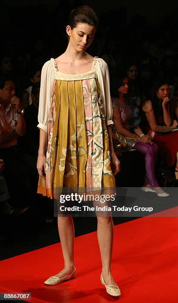 Model walks on the ramp with Fashion Designers Levi's Gen Next outfit at the Lakme Fashion Week-2008 in Mumbai, Maharashtra, India