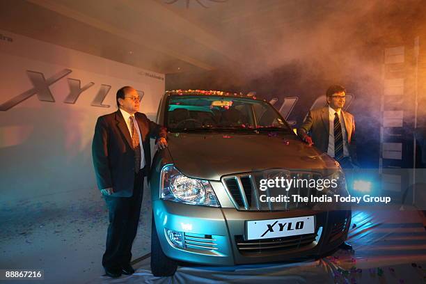 Rajesh Jejurikar, Chief of Operations in the Automotive Sector of Mahindra and Mahindra and general manager Gaurav Saxena Launching Xylo Car...