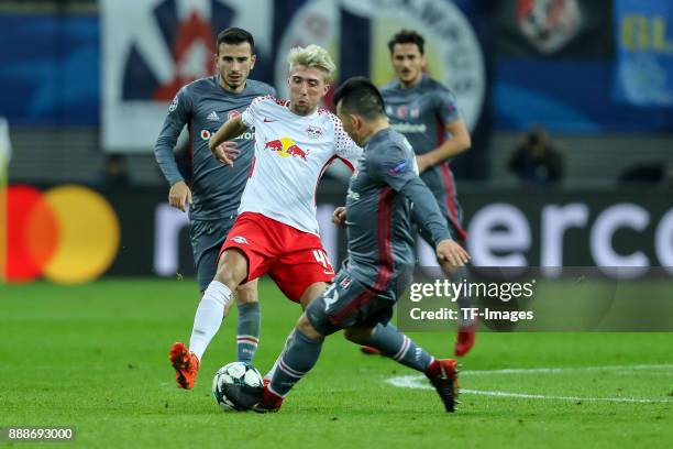 Kevin Kampl of Leipzig and Gary Medel of Besiktas battle for the ball during the UEFA Champions League group G soccer match between RB Leipzig and...