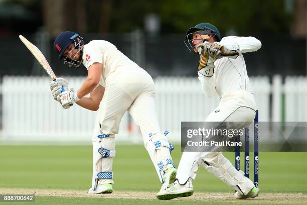 Josh Philippe of the CA XI takes the ball behind the stumps during the Two Day tour match between the Cricket Australia CA XI and England at...