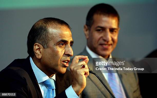 Sunil Mittal, Chairman and MD, Bharti Group with Rajan Bharti Mittal, during a press conference in New Delhi, India