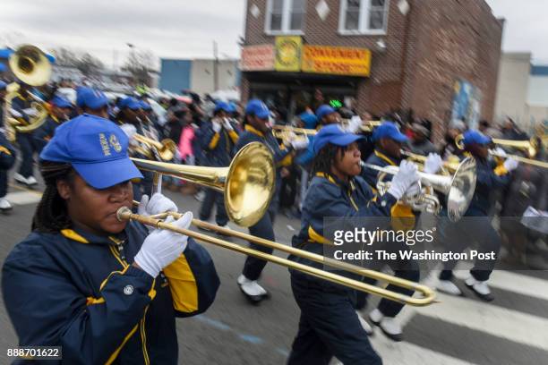 The Ballou High School marching band participates in the 11th Annual MLK Peace Walk and Parade as it makes its way up Martin Luther King Avenue SE on...