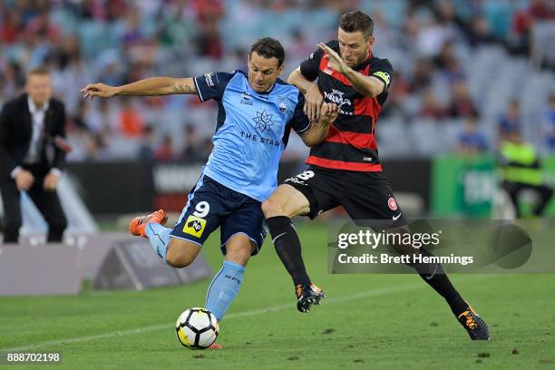 Bobo of Sydney and Robert Cornthwaite of the Wanderers contests the ball during the round 10 A-League match between the Western Sydney Wanderers and...