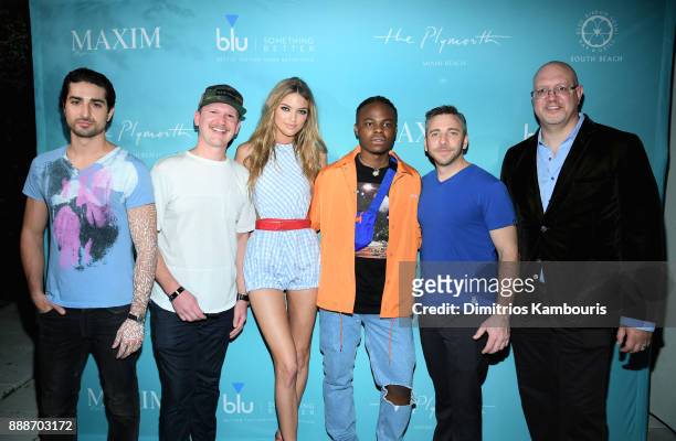 Marco Santini, Matt Kessle, Martha Hunt, Daye Jack, Nick Larkins and Robert Price attend the Maxim December Miami Issue Party Presented by blu on...