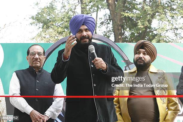 Vijay Kumar Malhotra, BJP Leader and MP from South Delhi along with Navjot Singh Sidhu, Former Indian Cricket Player and BJP MP and Daler Mehndi,...