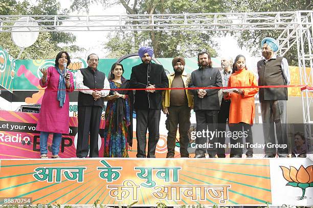 Vijay Kumar Malhotra, BJP Leader and MP from South Delhi along with Navjot Singh Sidhu, Former Indian Cricket Player and BJP MP, Daler Mehndi,...