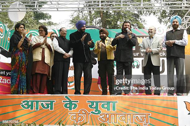 Vijay Kumar Malhotra, BJP Leader and MP from South Delhi along with Navjot Singh Sidhu, Former Indian Cricket Player and BJP MP, Daler Mehndi,...