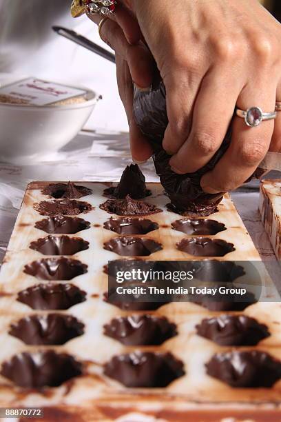 Zeba Kohli, MD, Fantasie Fine Chocolates, the premium brand of hand-made chocolates, making some delicious chocolates at her store in Marine Lines,...