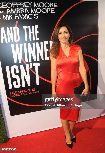 Actress Carlotta Montanari arrives for the Premiere Of "And The Winner Isn't" at Laemmle Music Hall on December 8, 2017 in Beverly Hills, California.