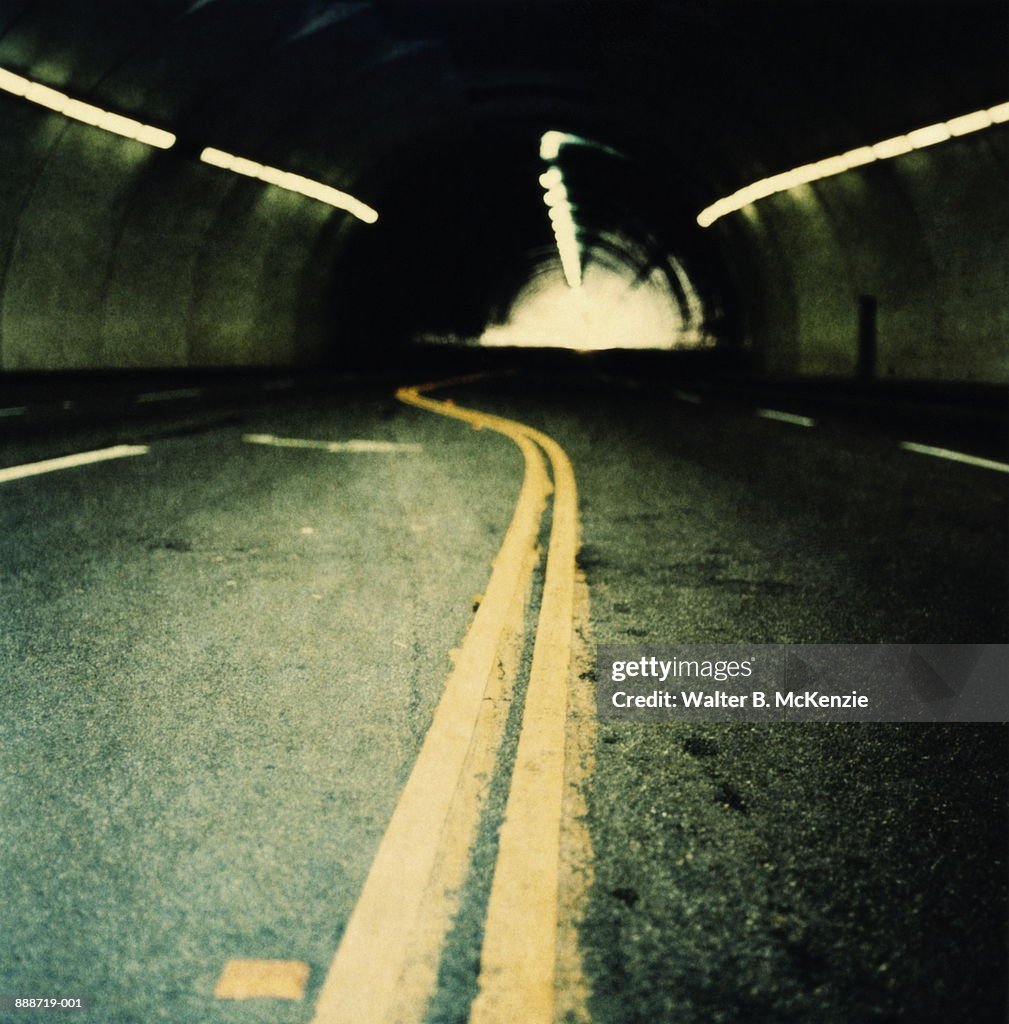 Empty road in tunnel (paper negative)