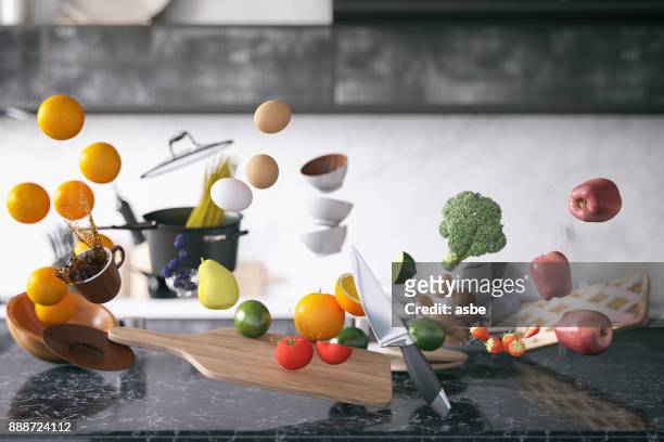 zero gravity in keuken - creative food stockfoto's en -beelden