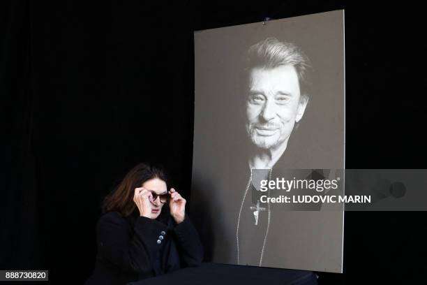 French actress Anouk Aimee arrives at the La Madeleine Church prior to the funeral ceremony in tribute to late French singer Johnny Hallyday on...