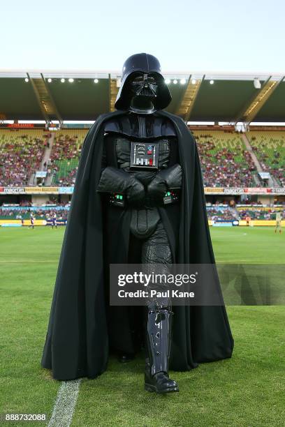 Darth Vader walks from the field following the coin toss during the round 10 A-League match between the Perth Glory and the Newcastle Jets at nib...