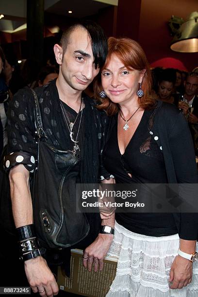 Buyer Robin Schulie and designer Aliona Gorchakova attend a launch of the book "Russian Style" by Evelina Khromtchenko on July 6, 2009 in Paris,...