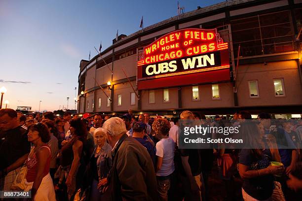 Cubs fans leave Wrigley Filed, after the Chicago Cubs defeated the Atlanta Braves 4-2, July 6, 2009 in Chicago, Illinois. The Tribune Company, which...