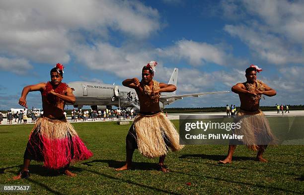 Tonga dancers greet Zealand Prime Minister John Key at the Fua'amotu International Airport, July 7, 2009 in Nuku'alofa, Tonga. The Prime Minister is...